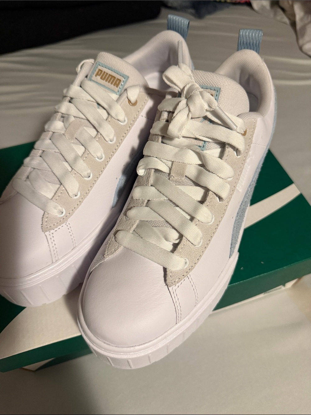 Puma Women's White Sneakers with Light Blue Accents